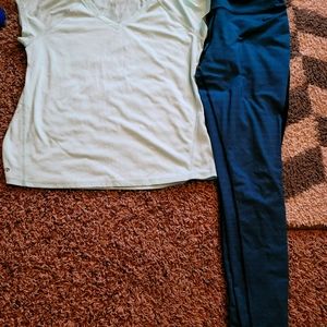 Nike pants paired with a mint green ideology top.